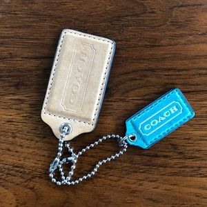 2 Coach dog tags / keychains